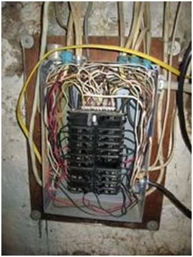 crowded electrical box|overcrowding electrical panels.